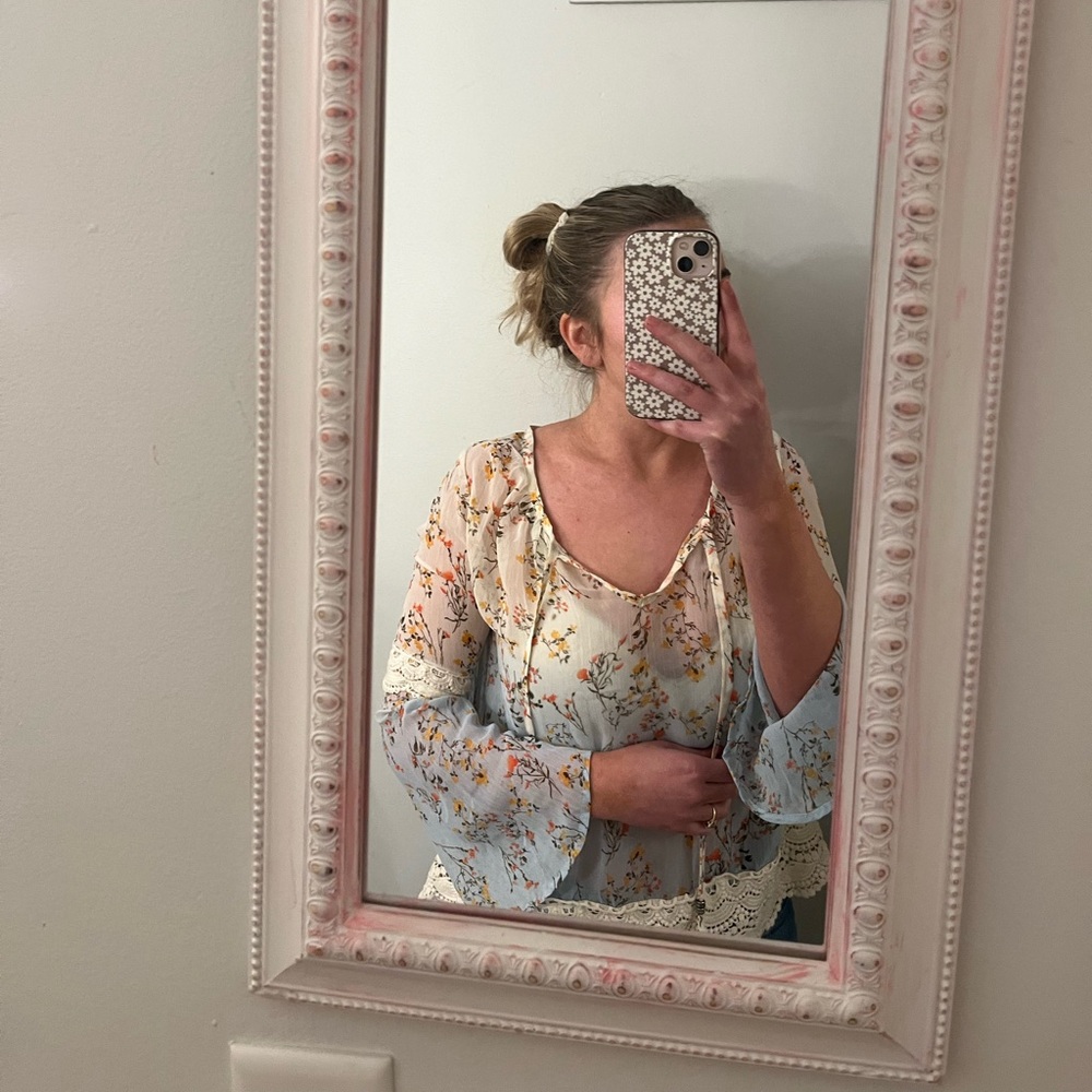 Blue floral top with lace edge